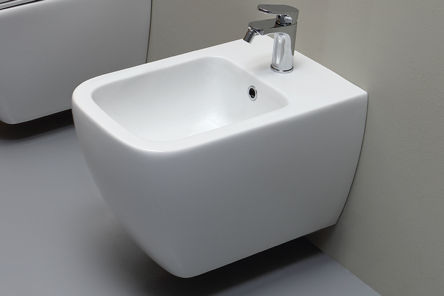 Vaso/Bidet Scarico a Pavimento con Erogatore per Disabili - Neox Ceram